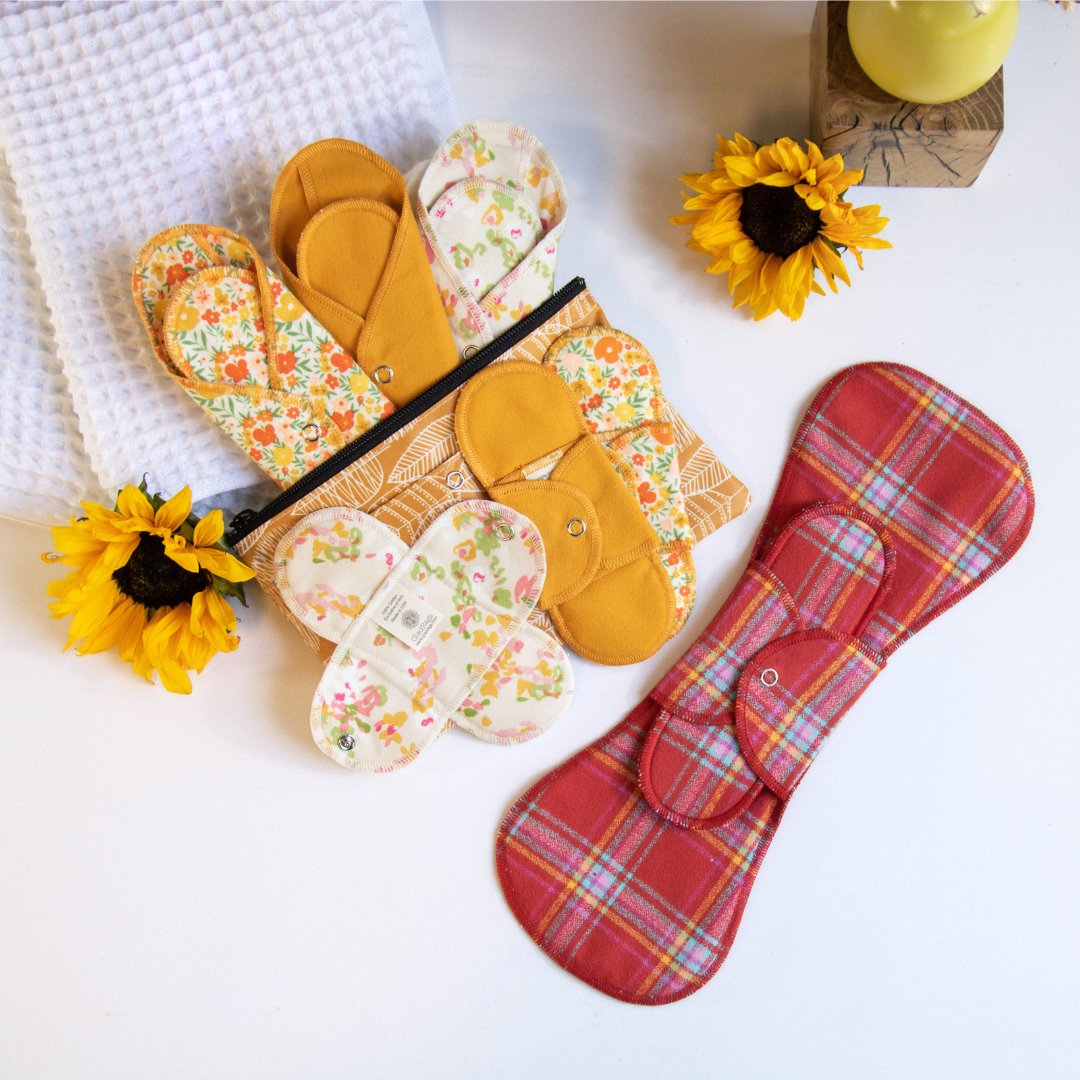 multicolored cloth pads on a white background with sunflowers