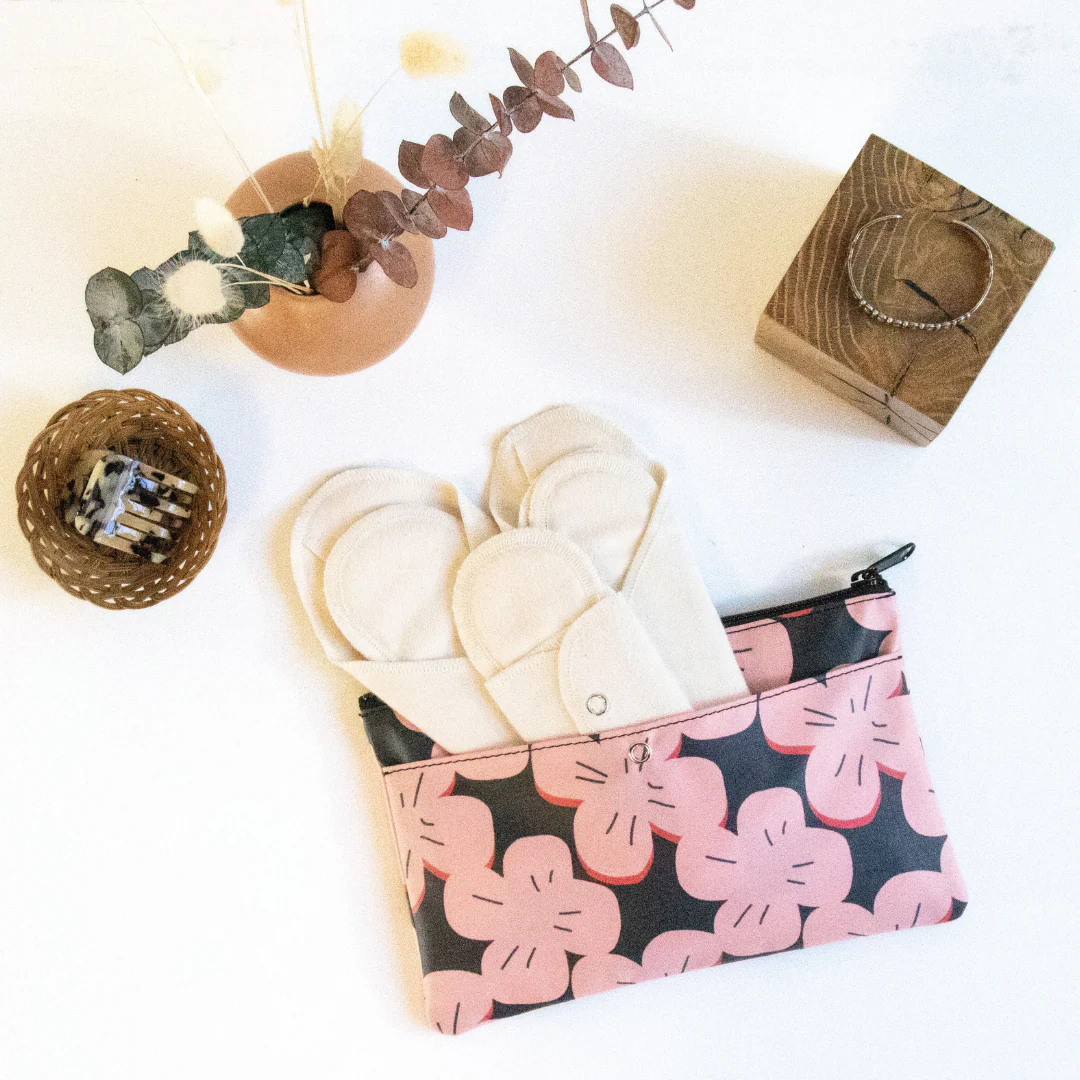 Organic cotton white pads in gladrags carry bag with pink flower design