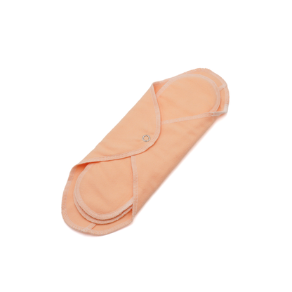 GladRags Day Pad Plus in Peach — longer reusable cotton cloth pad for extended coverage